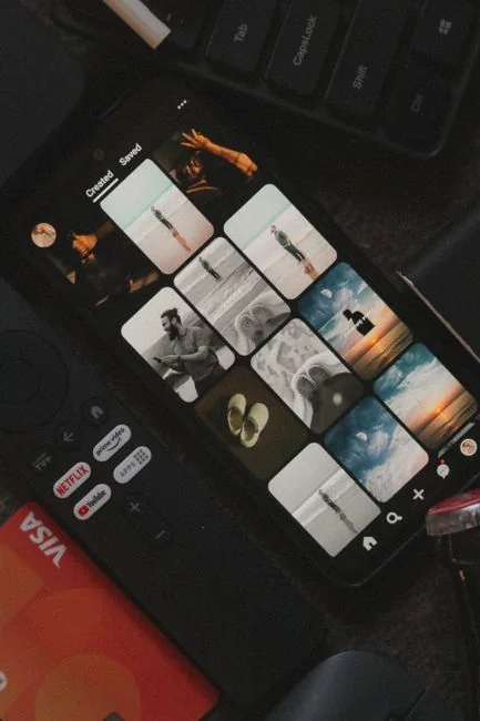 A smartphone displaying communication symbols for calls, email, and messaging on its screen.